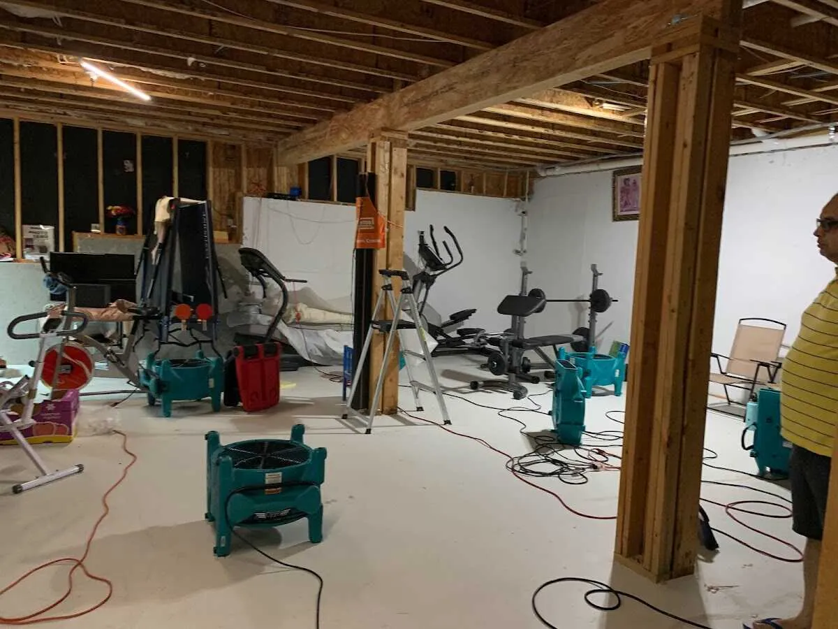 Basement drying equipment setup for Contents Cleaning & Restoration in Iowa City