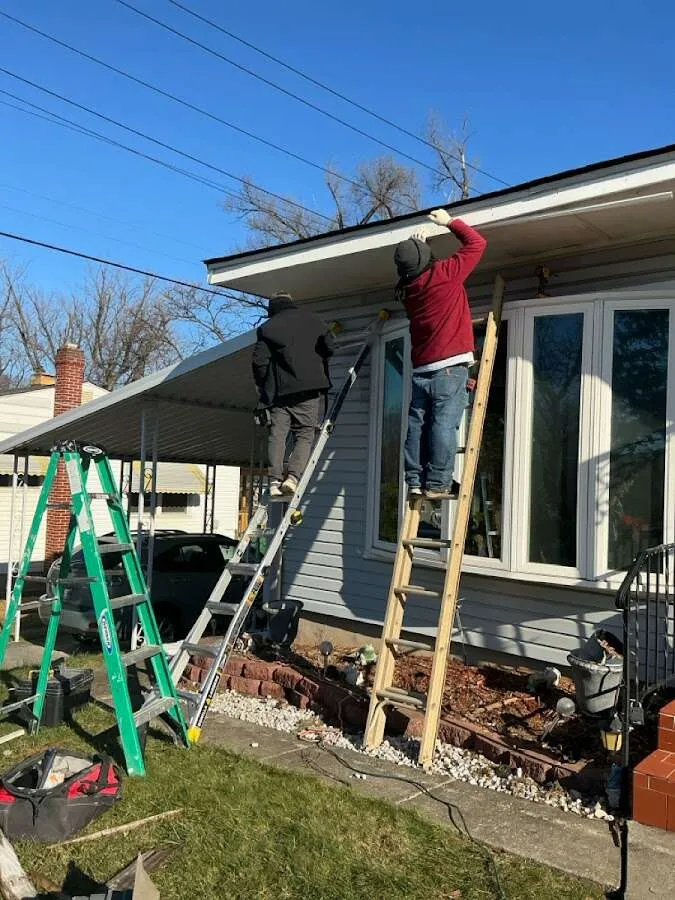Restoration crew performing exterior repair in Iowa City