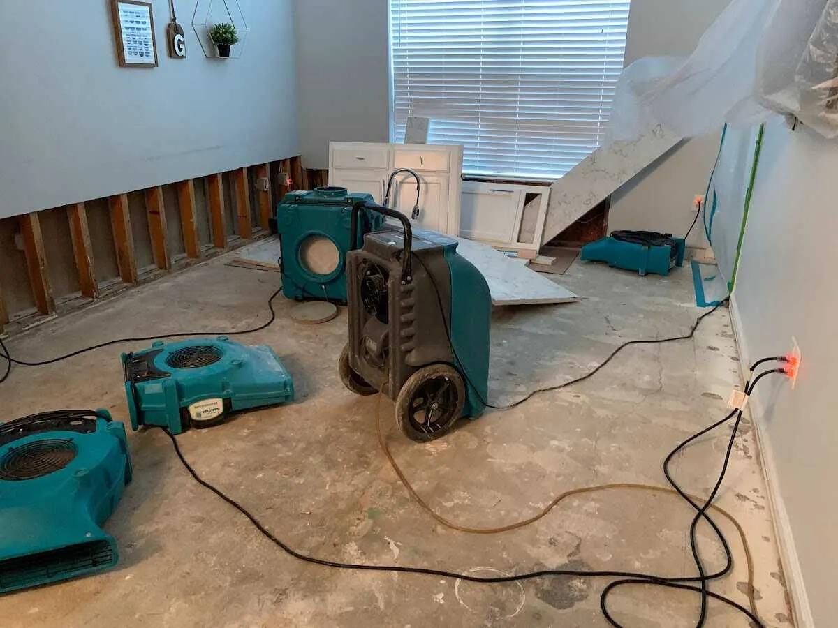 Dehumidifier in flood-cut room for Water Damage Restoration in Iowa City